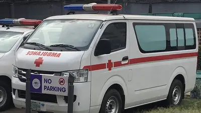 An ambulance parked outside a hospital